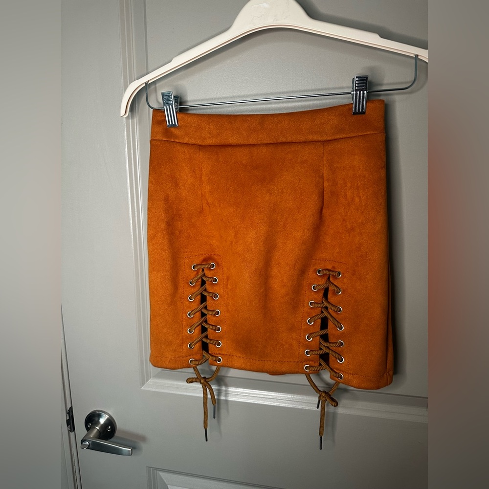 FAUX SUEDE TAN MINI SKIRT - LACE UP. PERFECT FOR COUNTRY CONCERTS OR EDGY LOOKS!